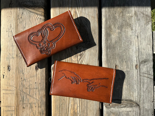 Hand of god leather clutch